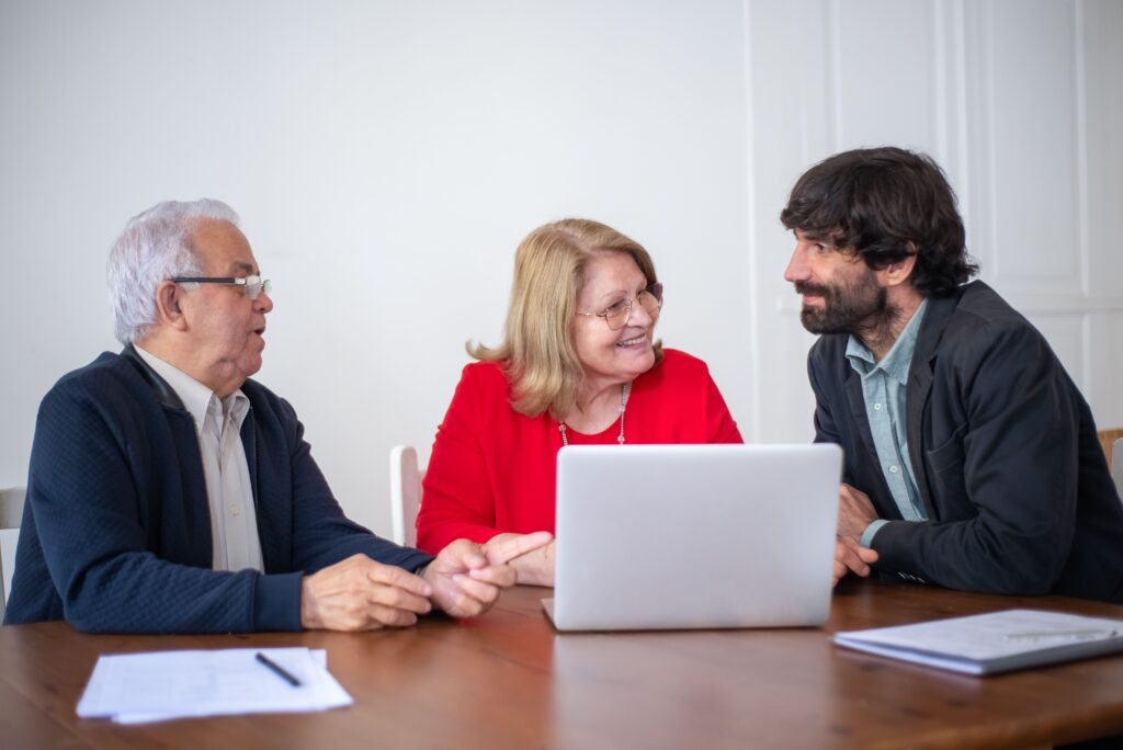 Homeowners reviewing mortgage and refinance options with their loan broker
